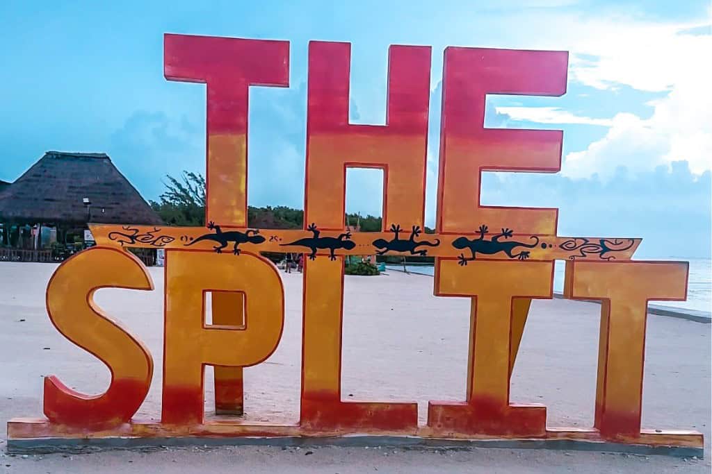 Red and orange brightly painted letters that say The Split