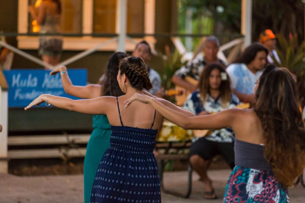 A group of hula dancers at a festival in Kauai Hawaii